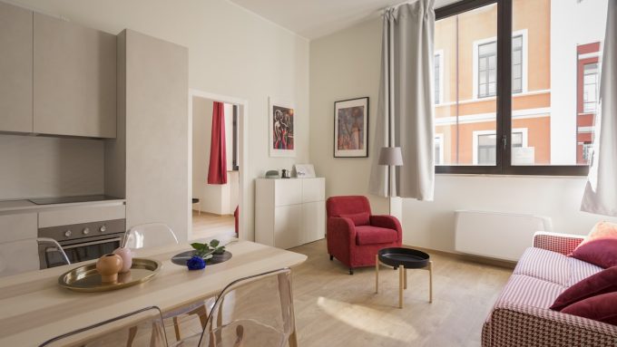 Spazio comune co-living moderno — co-living Mezzogiorno mercato immobiliare emergente